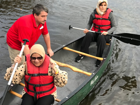 two ladies in a canoe